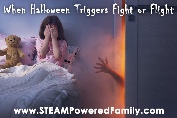A child is hiding their face in their bed as a hand reaches out from the closet. Overlay text says When Halloween Triggers Fight or Flight