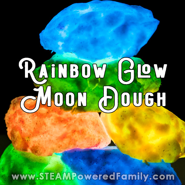 On a black background moon dough glows in a variety of colours - blue, green, orange, yellow and darker greens and blues. Overlay text says Rainbow Glow Moon Dough