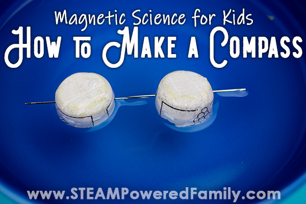 Two homemade compasses created with wine corks and needles float in a blue bowl of water. Their needles have aligned so they are attached and pointing in the same direction. The words Magnetic science for kids, how to make a compass are written across the top of the image.