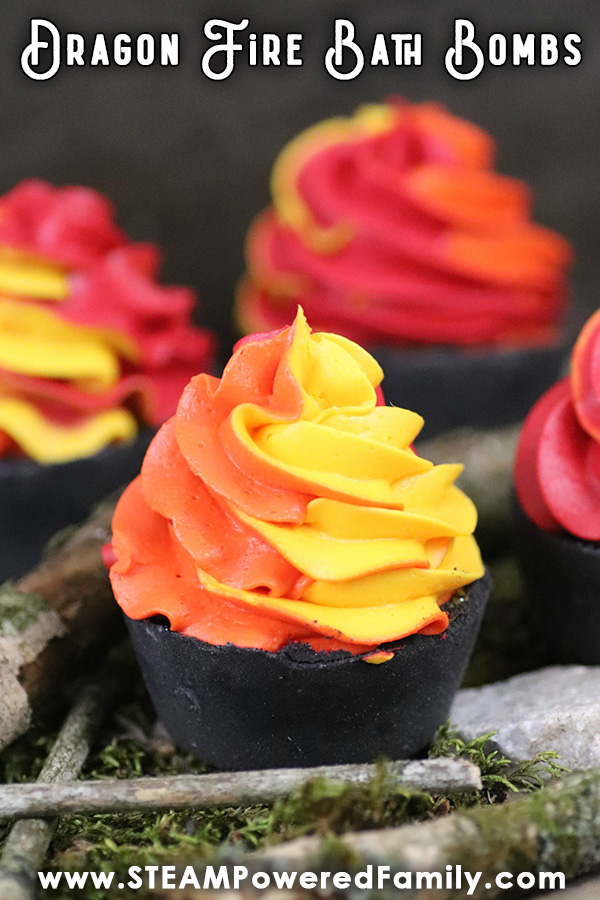 These DIY Dragon Bath Bombs are inspired by their fire! Dragon Fire Bath Bombs are a stunning DIY bath bomb project with activated charcoal cupcake bases that are then topped with whipped soap icing that looks like roaring flames. The result will be coveted by dragon lovers everywhere! A fantastic project for teens, especially as part of a camp (they could also be campfire bath bombs), or as a gorgeous homemade gift. Easy step by step instructions here. #Dragon #BathBomb #BlackBathBomb #Fire via @steampoweredfam