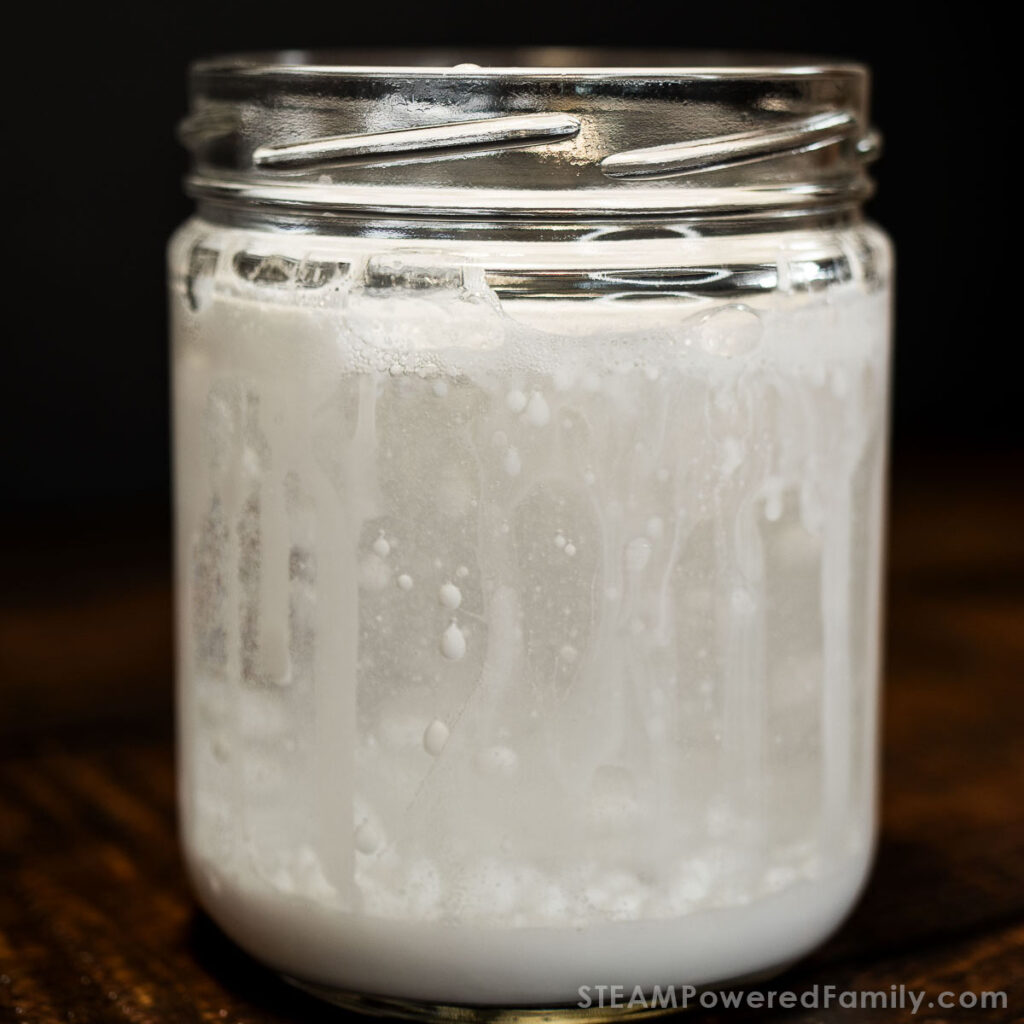 snow in a jar experiment showing paint build up