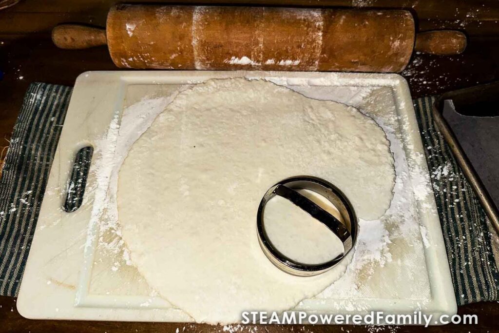 Roll out and cut clay with cookie cutters to make air dry ornaments