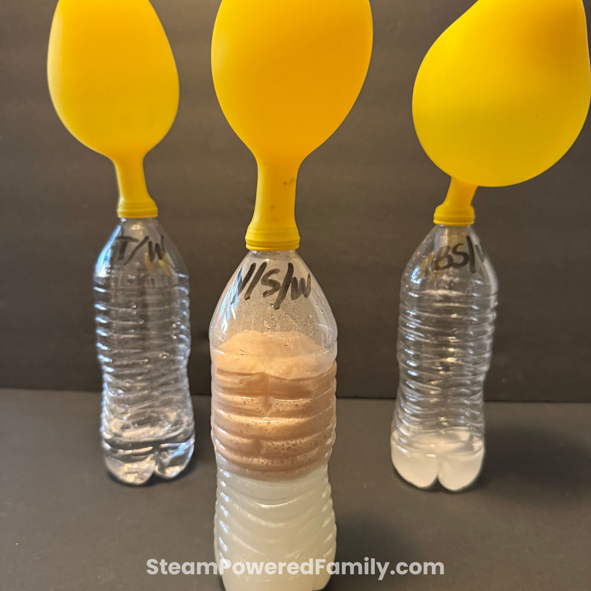 Balloons inflating with gas